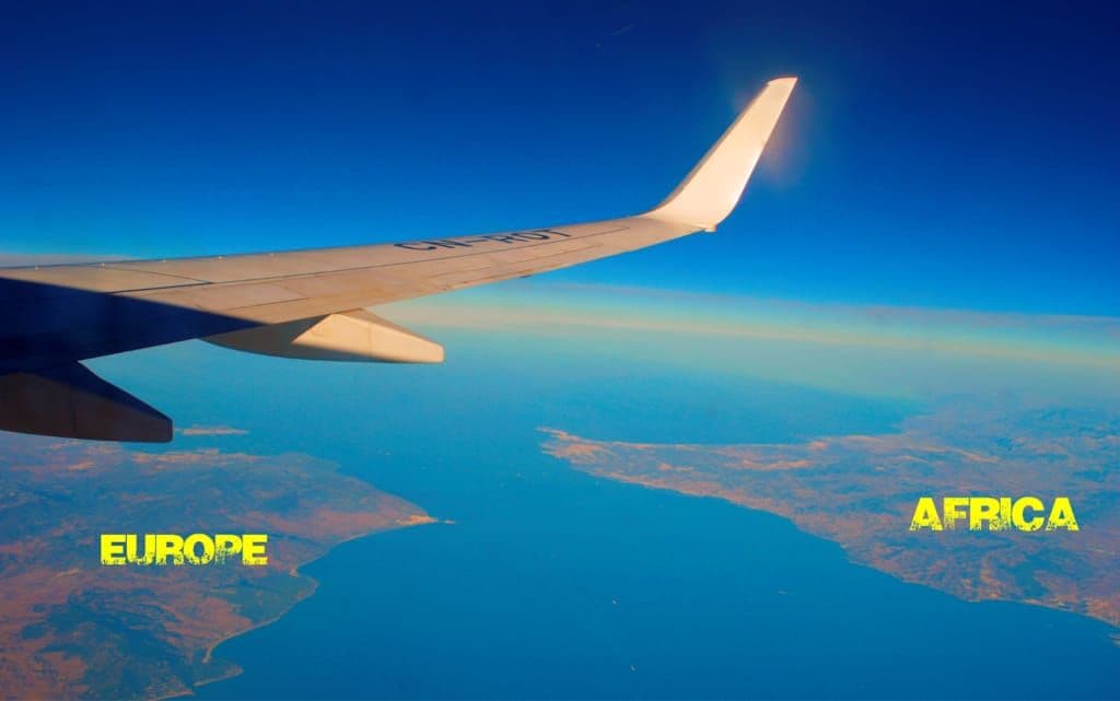 An aircraft flying between Africa and Europe