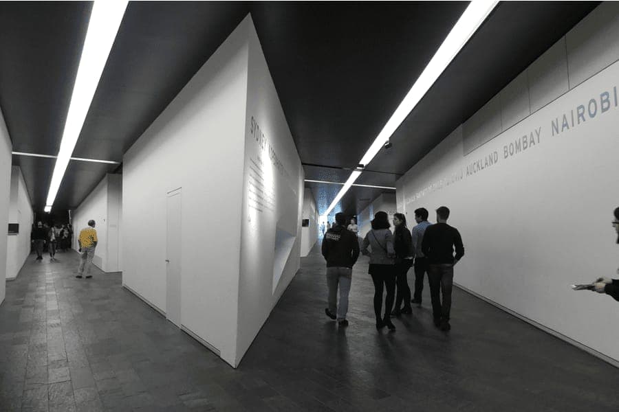 Visitors walking through a gallery at the Jewish Museum in Berlin