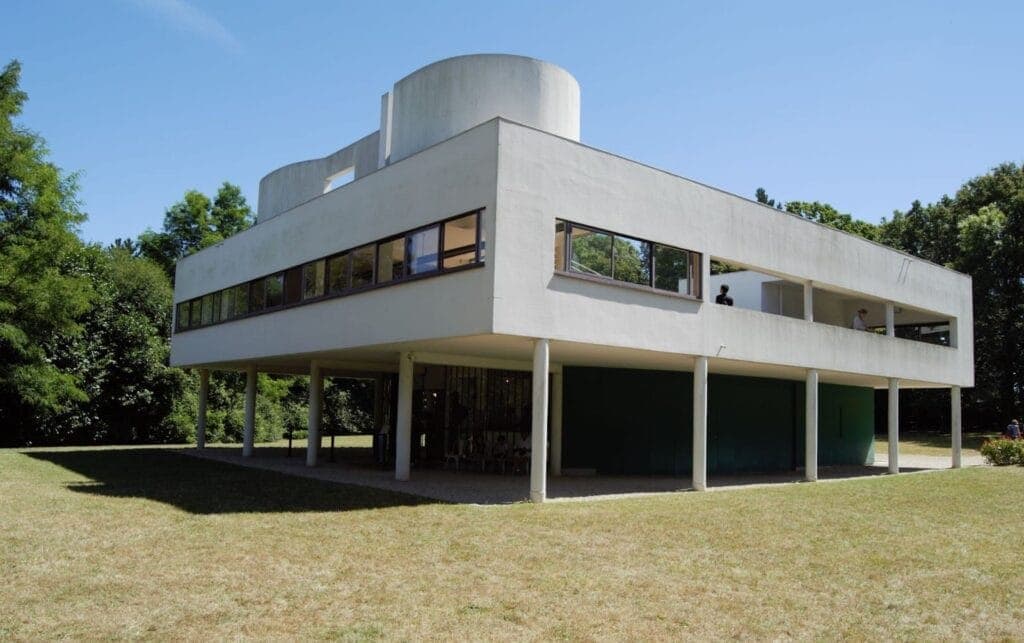 Villa Savoye by Le Corbusier, raised on its columns above the lawn